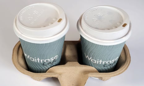 a pair of waitrose coffee cups in a cardboard harness
