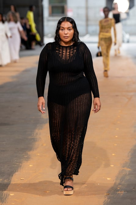 “Plus-sized” supermodel Paloma Elsesser in a long knitted dress and platform sandals on the Gabriela Hearst spring 2023 runway  