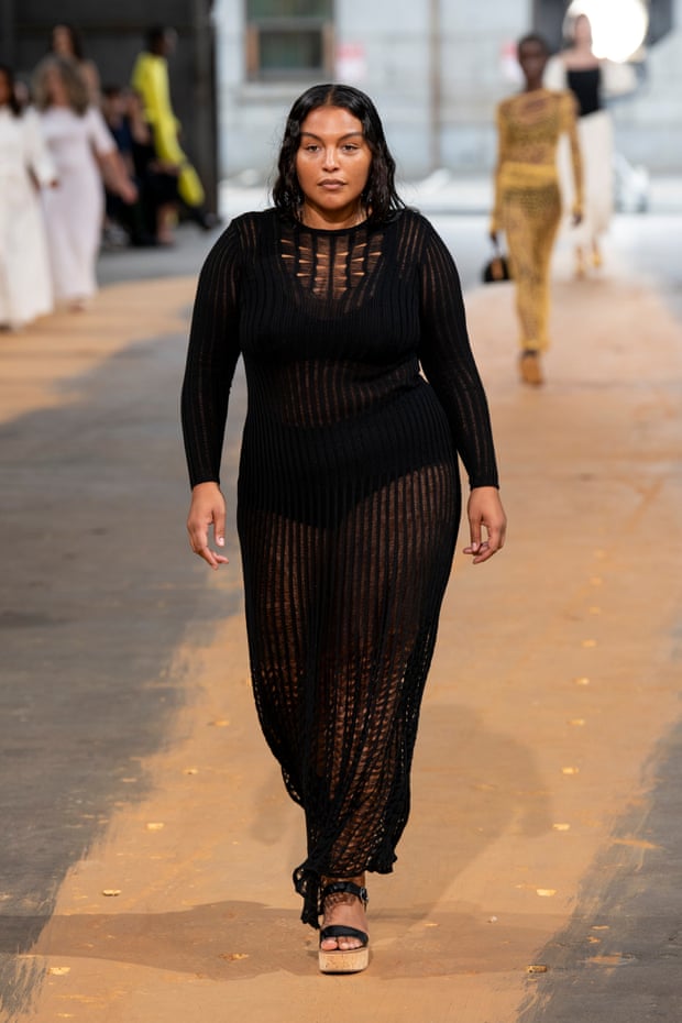“Plus-sized” supermodel Paloma Elsesser in a long knitted dress and platform sandals on the Gabriela Hearst spring 2023 runway
