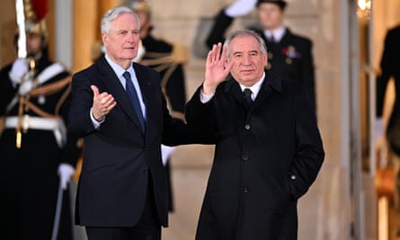 Former French prime minister Michel Barnier, left, and the newly appointed François Bayrou.