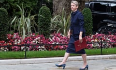 Yvette Cooper walks up Downing Street holding her ministerial papers