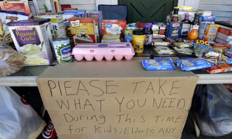 A community table is filled with groceries for those in need and impacted by the coronavirus in New Hampshire, US.