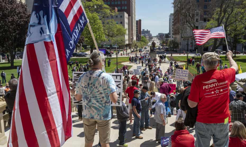 Protesters in Michigan oppose the state’s stay-at-home order. Tea Party Patriots have spearheaded a drive to mobilize doctors urging states to move faster.