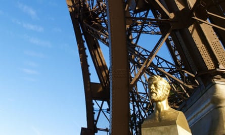 A bust of Gustave Eiffel by one pillar of the tower.