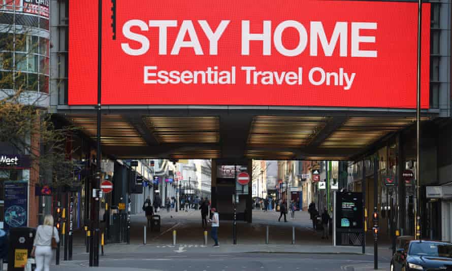 An information board displays a message asking people to 'stay at home' in Manchester, March 27, 2020.