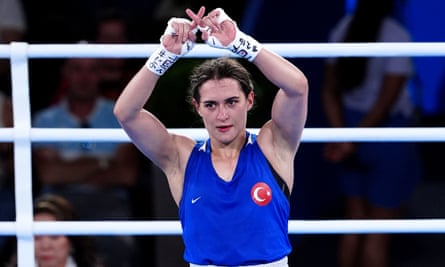 Turkey’s defeated Esra Yildiz Kahraman makes an ‘X’ sign with her hands following defeat by Chinese Taipei’s Lin Yu-Ting, a gesture taken to be a reference to XX chromosomes.