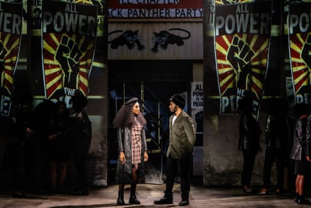 The characters of Chaka Khan and Fred Hampton look at each other below a Black Panther chapter banner.