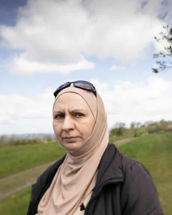 Um Alaa fears her residence permit will not be renewed; her house in Syria has been destroyed.