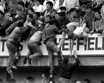 Spectators at the 1989 Liverpool v Nottingham Forest game in Hillsborough trying to escape overcrowding the FA Cup semi-final.