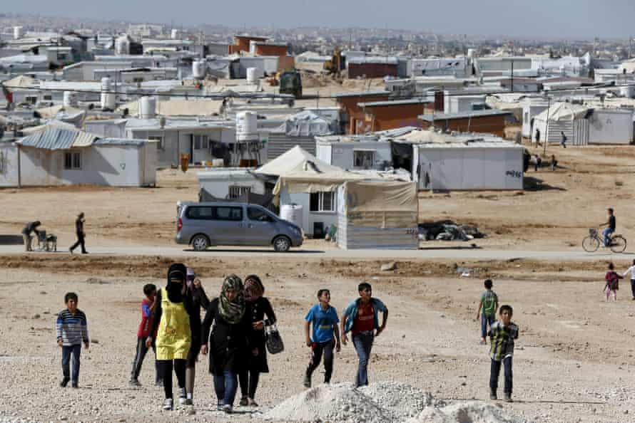Syrian refugees walk at Al Zaatari refugee camp in the Jordanian city of Mafraq, near the border with Syria, November 1, 2015. REUTERS/ Muhammad Hamed