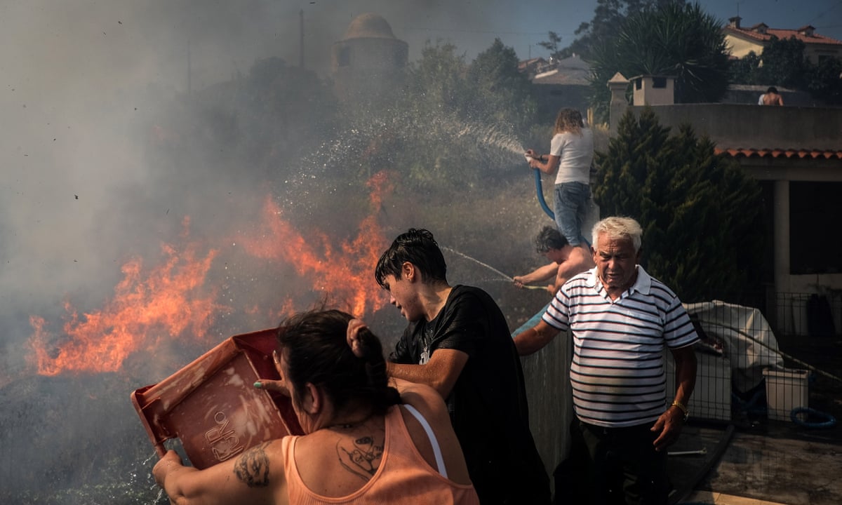 Dozens injured in Portugal wildfires as heatwave to intensify | Portugal | The Guardian