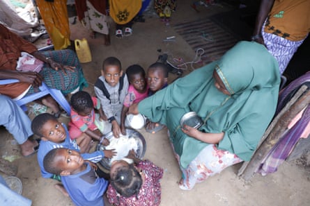 Fadumo Ali Mohamed with her children in camp