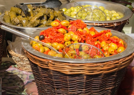 Prepared Olives in big baskets at Eastnor Chilli festival Herefordshire UK