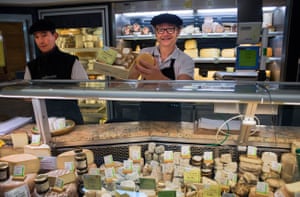 Cheese stall on the Marché de Talensac, Nantes, France.