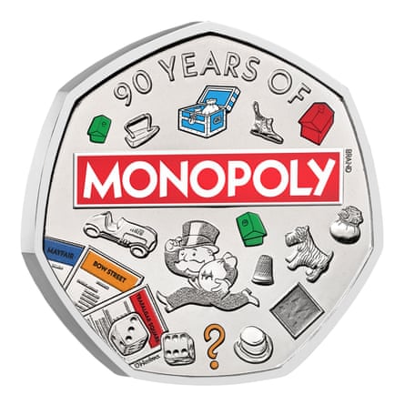 A 50p with the word Monopoly across it, surrounded with symbols from the game.