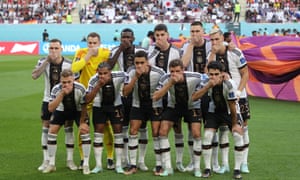 The German team put their hands over their mouths before their match with Japan on Wednesday