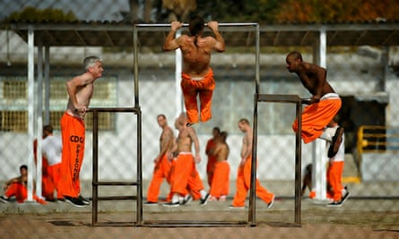 Inmates at Chino state prison exercise in the yard.