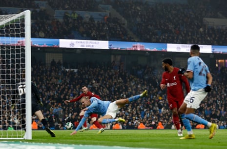 Erling Haaland just misses the cross with the goal agape.