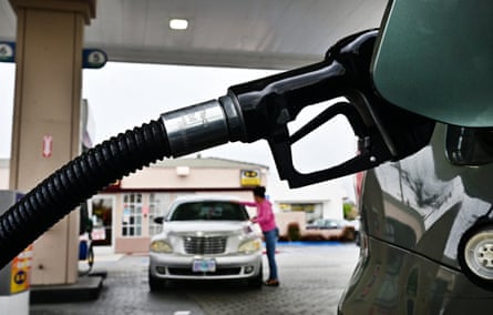 people at a gas station