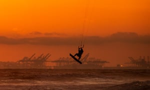 Kite surfing in Huntington Beach, California, yesterday.