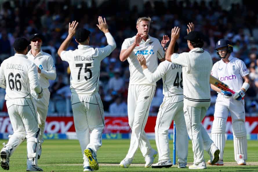 Kyle Jamieson celebrates with teammates after the dismissal of Ollie Pope.