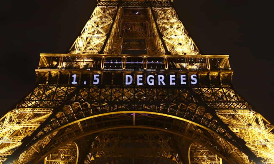 The slogan '1.5 degrees' is projected on the Eiffel Tower as part of the COP21, United Nations Climate Change Conference in Paris, France, Dec 2015
