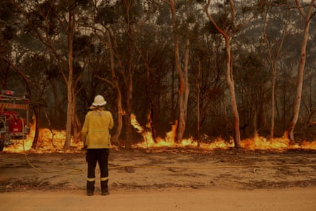 Firefighting crews conduct a backburn near Braidwood, NSW, on Tuesday.