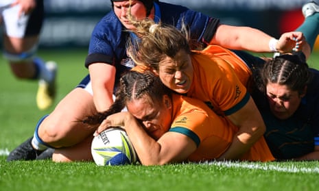 Ashley Marsters of Australia scores the match-winning try in the Rugby World Cup match between Scotland and Australia on October 15, 2022, in Whangarei.