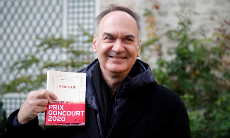 Hervé Le Tellier poses at his publishing house Gallimard after winning the Prix Goncourt for L’Anomalie.