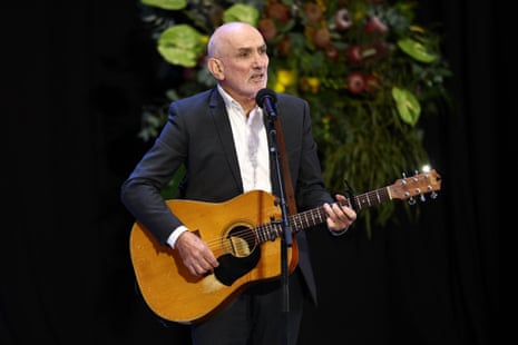 Paul Kelly performs during Neale Daniher’s state funeral