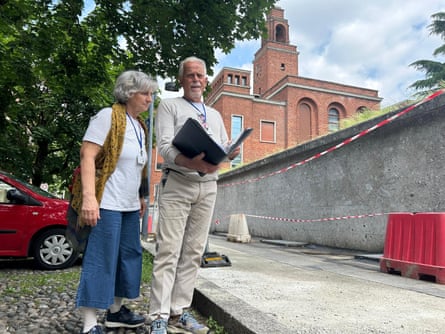 Gabriella Garatti and Roberto Cremona inspect contruction work