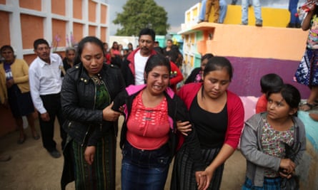 The family of a girl who died at Hogar Seguro mourn in the village of Yerbabuena, Guatemala