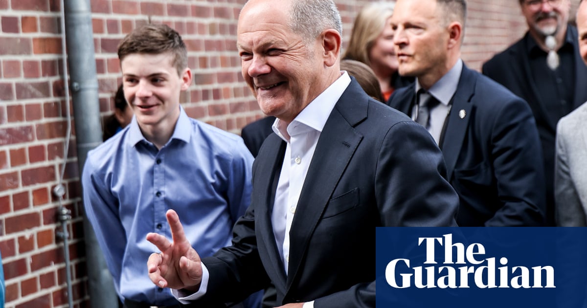 Scholz to hand over power in Germany to sound of feminist anthem Respect