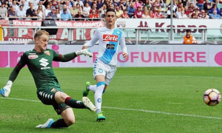 The Torino goalkeeper Joe Hart kicks the ball past Napoli’s José Callejón during the Serie A match.