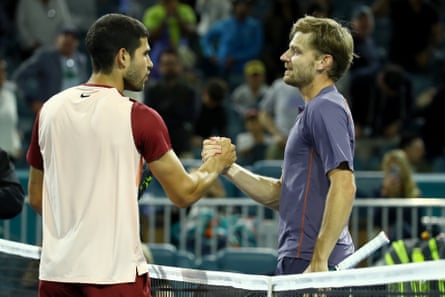 David Goffin and Carlos Alcaraz shake hands after Goffin's victory in Miami