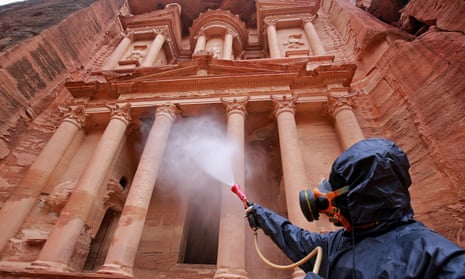 A worker disinfects monuments in Jordan’s archaeological city of Petra to prevent the spread of coronavirus.