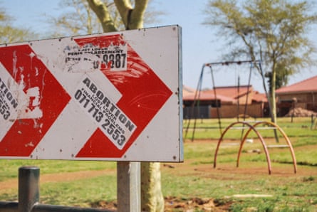 Posters advertising abortion in the township of Soshanguve.