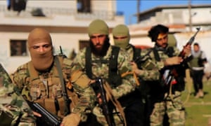 Fighters from Syria’s al-Qaida-linked al-Nusra front. Panorama claims the branch handpicked police officers for two stations in Idlib province.