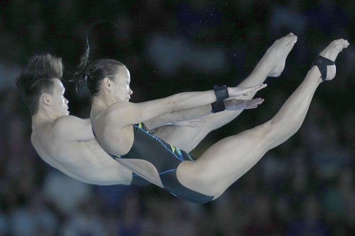 Malaysia’s Pandelela Pamg, right and Jellson Jabillin perform during the mixed synchronised 10m platform final.