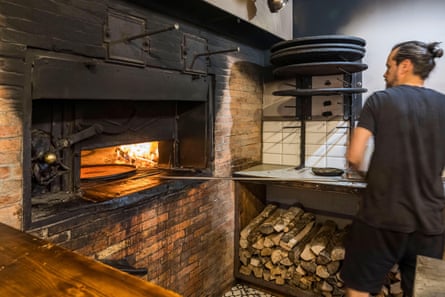 Making socca – chickpea-flour pancakes – another speciality of Nice, at Chez Theresa.