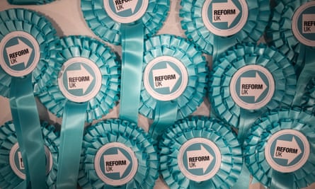 Reform UK rosettes on sale at the party conference.