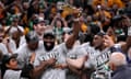 The Boston Celtics celebrate after clinching a place in the NBA finals with a sweep of the Indiana Pacers
