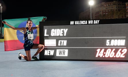 Ethiopia’s Letesenbet Gidey with the board showing her 5,000m world record of 14min 6.62sec