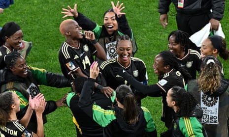 Jamaica players celebrate after securing their first ever Women’s World Cup point.