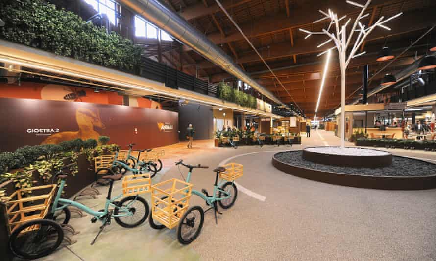 Shoppers can use tricycles to get around the food hall.