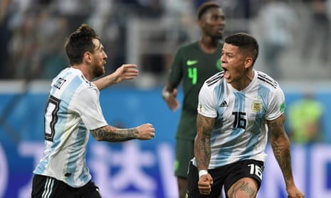 Marcos Rojo celebrates his dramatic winner with Lionel Messi.