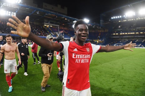 Arsenal’s Bukayo Saka celebrates after the final whistle.
