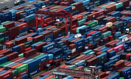 Shipping containers stacked in the terminal at Busan port, South Korea.