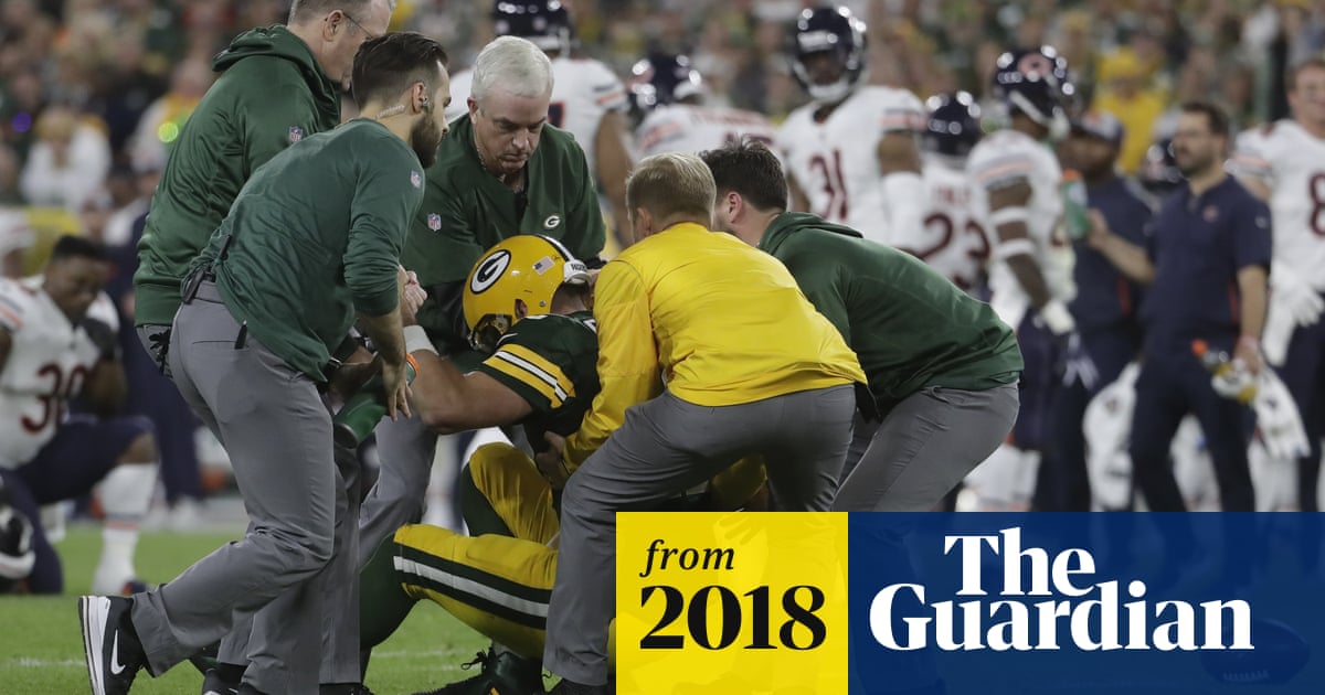 Aaron Rodgers Carted Off Field In Season Opener Then Returns To Win Thriller Sport The Guardian