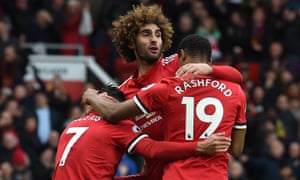 Marouane Fellaini celebrates after scoring the last minute winner for United.
